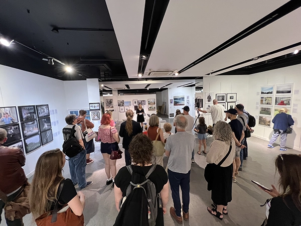 Visitors and participants attending a curated artist talk during the Making Voices Heard 1st Edition.