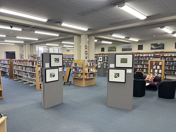 Interior view of the two-week 'Stories Re-imagined' photography exhibition held at Winsford Library in November 2025